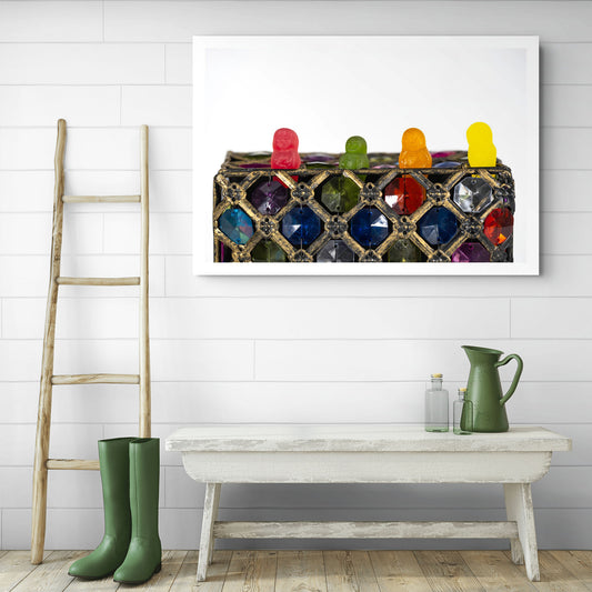 You're A Gem - 267032v1 photographic artwork showing four colourful confectionery figures perched above an ornate jewel-covered object, displayed in a contemporary interior.
