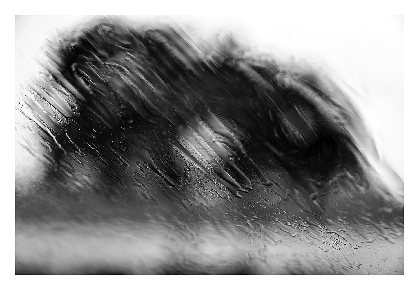 Coastal Noir 8100 - 104x74cm, black and white abstract coastal photograph with blurred dune or foliage behind rain-streaked glass, atmospheric fine art print.