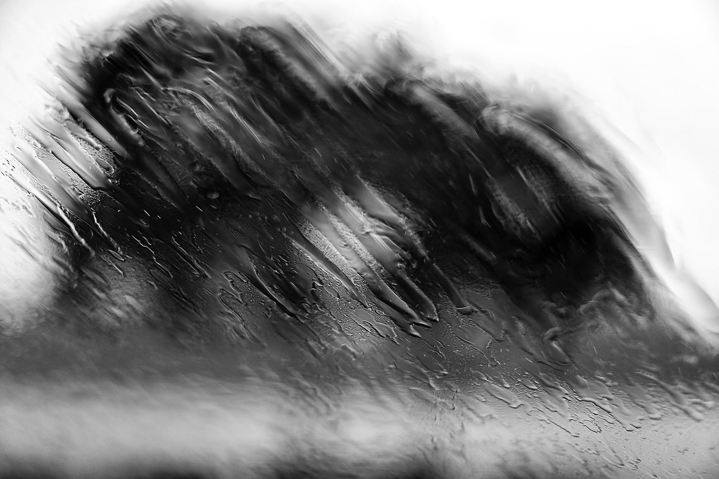 Coastal Noir 8100 - 90x60cm, black and white abstract coastal photograph with blurred dune or foliage behind rain-streaked glass, atmospheric fine art print.