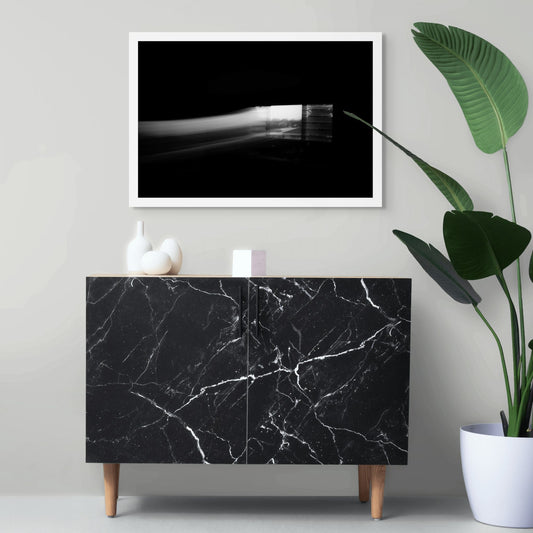 Dancing into the Light 7874 - Room View, expressive black and white artwork featuring light and movement, limited edition fine art print by Raymond Mather, ART1.