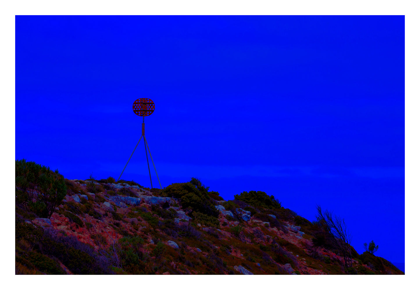 Vivid Country - Cape Jervis Heysen Trail - 7290v2 - 104x74cm, a lone marker on the Heysen Trail stands atop a rocky hill under a vivid cobalt blue sky, evoking solitude and direction on South Australia’s coast.