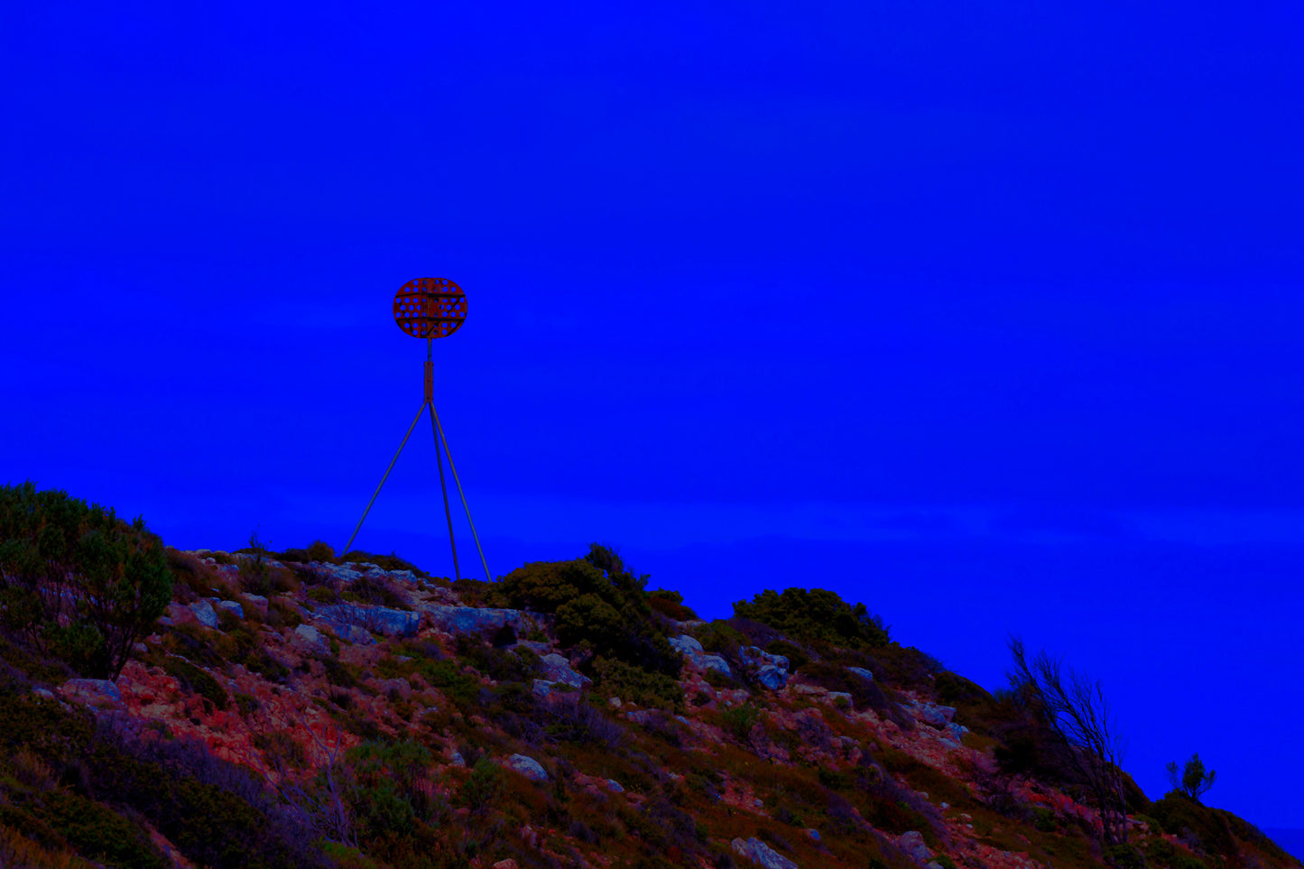 Vivid Country - Cape Jervis Heysen Trail - 7290v2 - 90x60cm, a lone marker on the Heysen Trail stands atop a rocky hill under a vivid cobalt blue sky, evoking solitude and direction on South Australia’s coast.