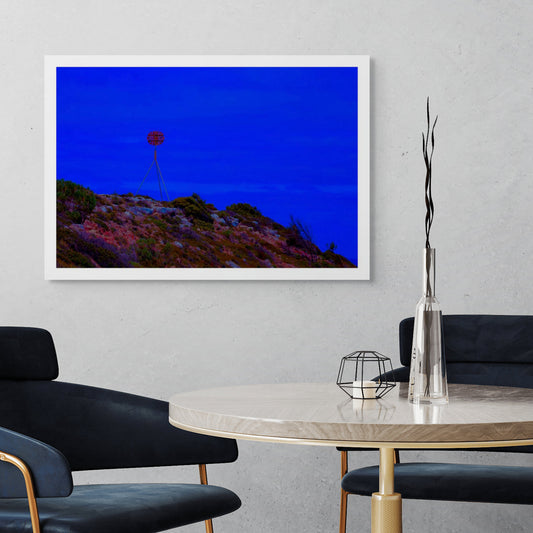 Vivid Country - Cape Jervis Heysen Trail - 7290v2 - Room View, a lone marker on the Heysen Trail stands atop a rocky hill under a vivid cobalt blue sky, evoking solitude and direction on South Australia’s coast.