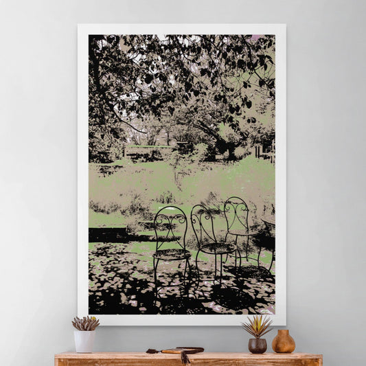 Vivid Country - Castlemaine Buda Garden Seats - 4313v25a - Room View, a trio of vintage wrought iron chairs in dappled shade beneath leafy trees, set against a muted garden backdrop in soft greens and earth tones.