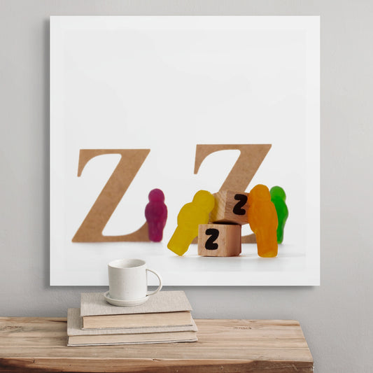 Catching Some ZZZ's 1493 - Room View, colourful jelly figures resting against wooden cubes with painted Zs, playful fine art still life by Raymond Mather, ART1.