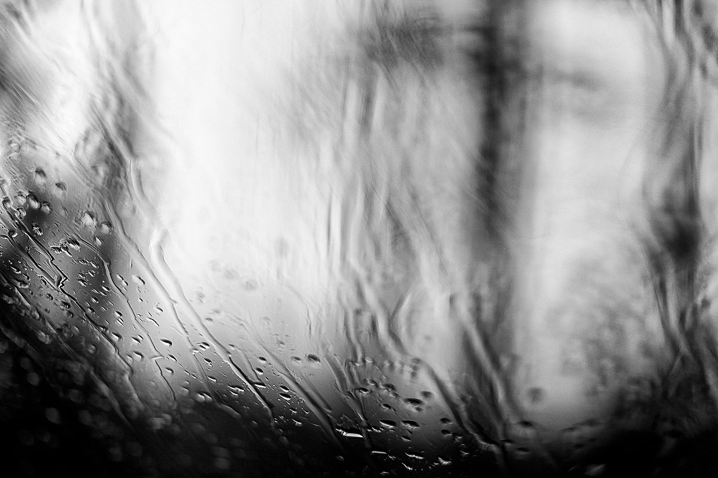 Coastal Noir 7924 - 90x60cm, black and white minimalist coastal photograph with delicate rain droplets on glass creating abstract textures.