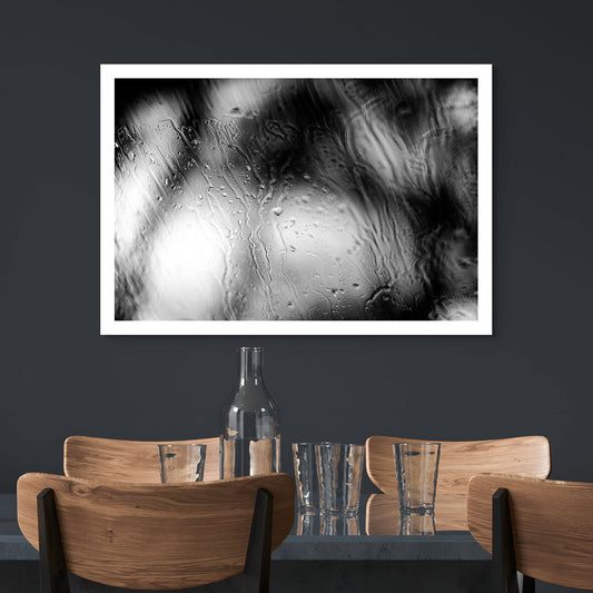 Coastal Noir 8000 - Room View, black and white minimalist coastal photograph of rain-dappled glass with soft focus trees behind.