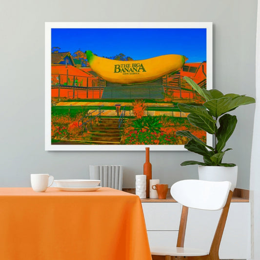 Vivid Country - Coffs Harbour Big Banana - 2173v56a - Room View, a vibrant Pop Art interpretation of the iconic Big Banana roadside attraction, set against a bright blue sky with exaggerated orange and green foreground.