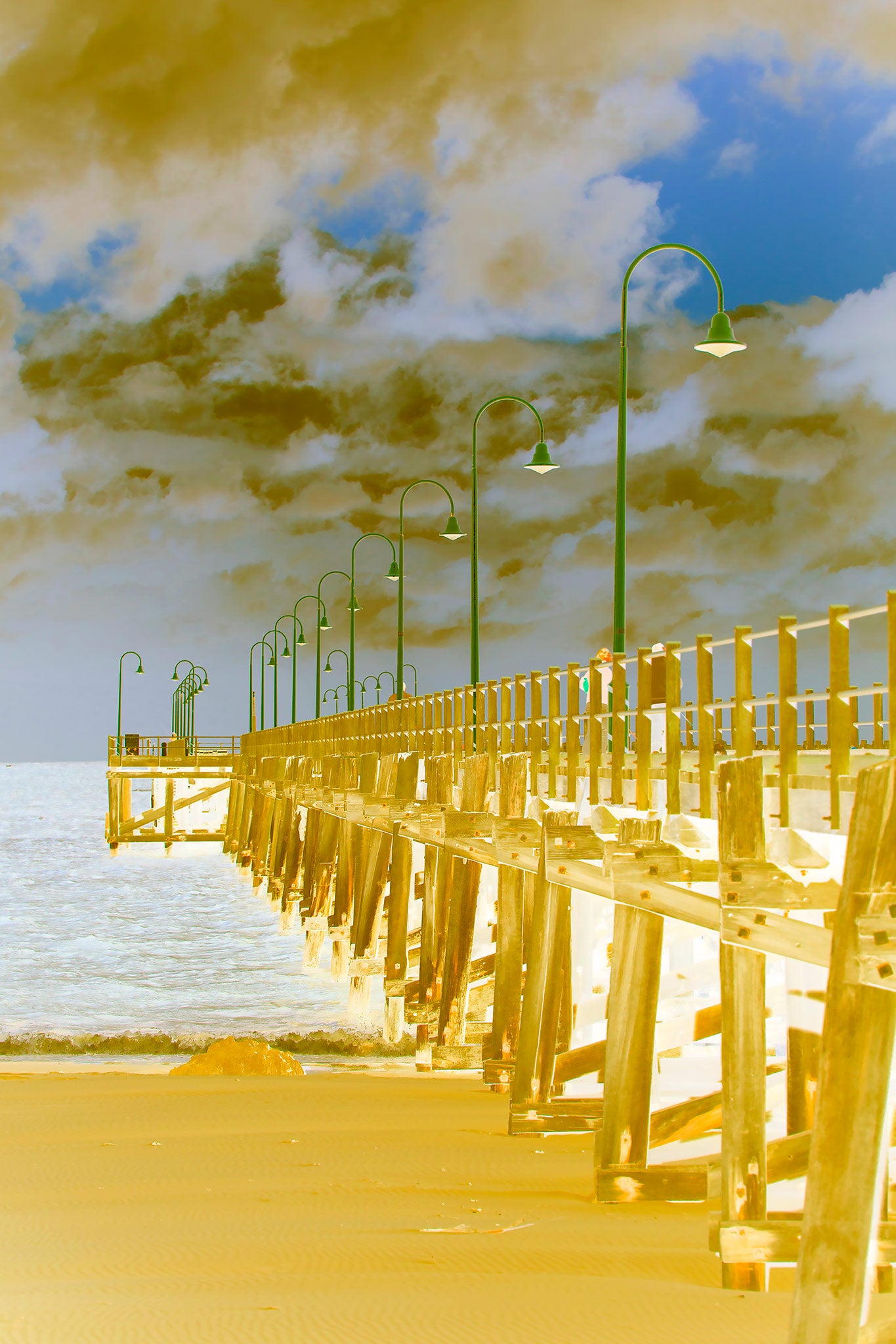 Vivid Country - Coffs Harbour Jetty - 6518v9a - 60x90cm, a fine art pop-style image of the Coffs Harbour Jetty under a moody sky, featuring golden timber tones and bright green lamp posts leading into the distance.