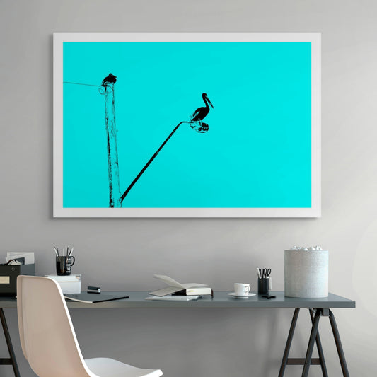 Vivid Country - Coffs Harbour Pelican Lamp Post - 6157v34b - Room View, a stylised turquoise sky sets the scene for a black silhouetted pelican perched on a streetlamp, with a second bird on a nearby pole, minimalist coastal urban wildlife in pop-art form.