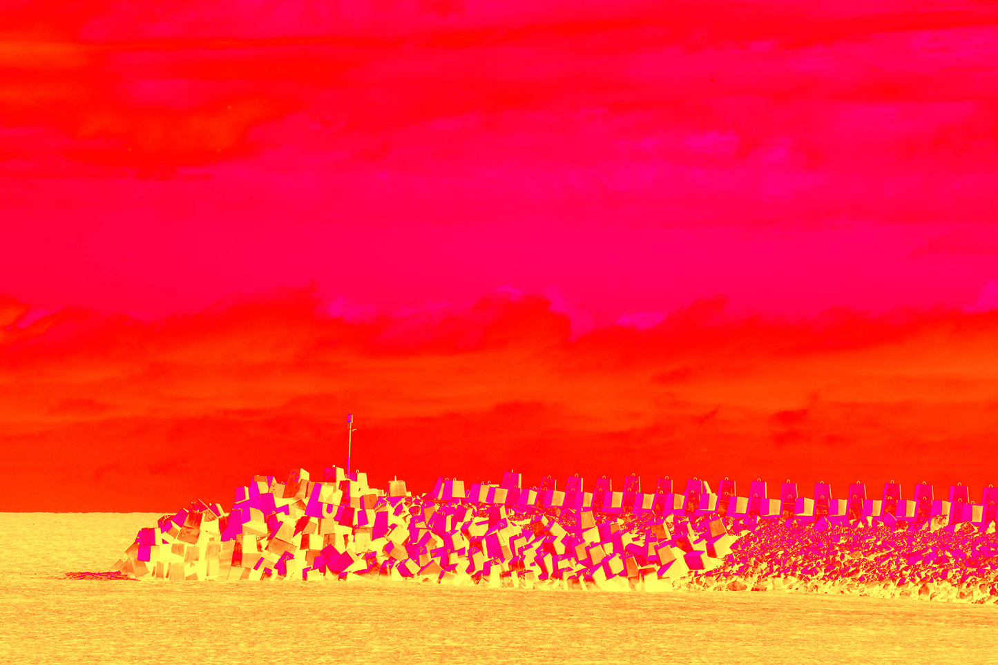 Vivid Country - Coffs Harbour South Breakwall - 6072v3 - 90x60cm, a surreal, neon-toned image of concrete blocks forming a breakwall beneath a vivid pink and orange sky, bathed in bold yellow hues.