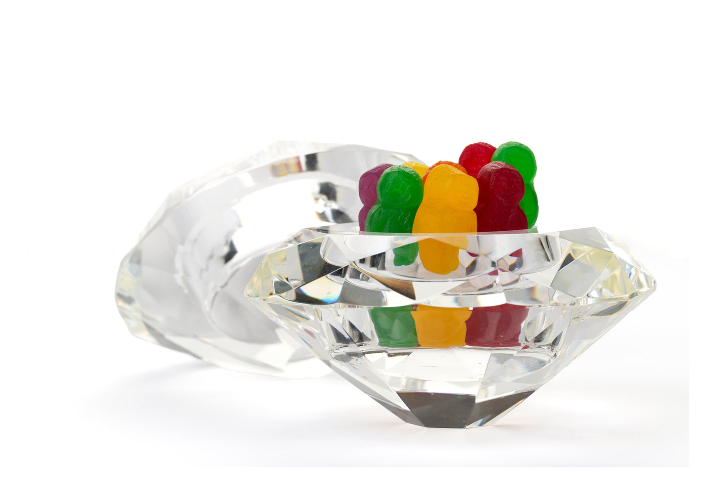 Diamonds Are 1643 - 104x74cm, colourful jelly baby figures standing upright in a large faceted crystal bowl shaped like a diamond, with a second gem behind, fine art photograph by Raymond Mather, ART1.