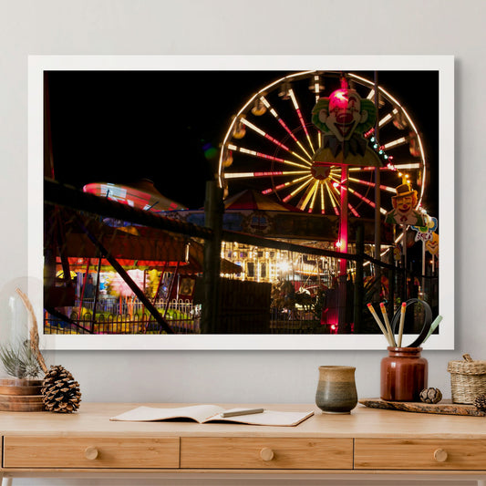 Fairground Carnival Lights 6900083 - Room View, night carnival view with Ferris wheel, glowing rides, and striking clown figure, fine art limited edition print by Raymond Mather, ART1.