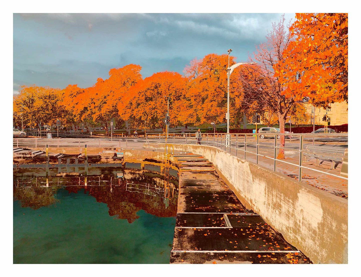 Vivid Country - Hobart Waterfront Esplanade - 0119v11a - 104x81.5cm, a richly coloured Pop Art-inspired view of Hobart’s waterfront showing a calm harbour edge, autumn leaves on the pavement, and a vibrant row of golden-orange trees under a grey-blue sky.