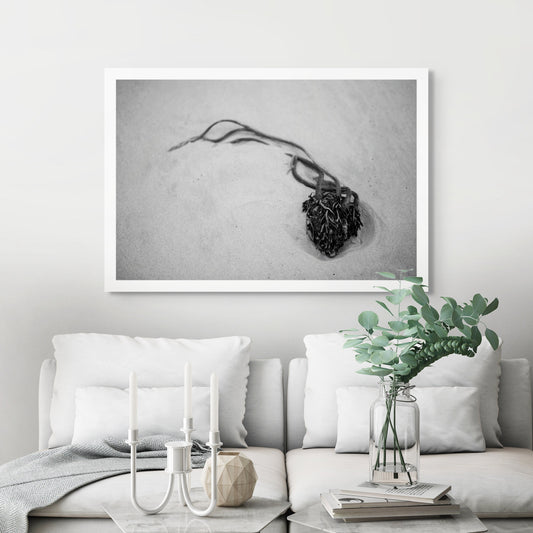 Monochrome Mix - Beach - Heart - 181462 - Room View, A heart-shaped clump of seaweed resting on fine beach sand, captured in high-contrast black and white. Evocative, minimal coastal still life. Limited edition fine art print.