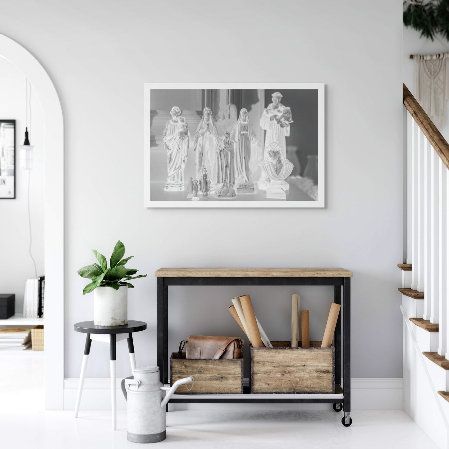 Monochrome Mix - Icons on the Mantel - 183072 - Room View, A monochrome image of religious figurines grouped on a mantel, including various Madonnas, saints, and a bust of Christ, evoking a serene and personal shrine.