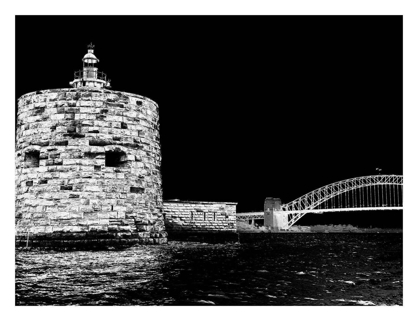 Monochrome Mix - Sydney - Fort Denison - Pinchgut Island - 209617v22a - 104x81.5cm, Black and white photo of Fort Denison in Sydney Harbour with the Harbour Bridge in the background; high contrast night sky and rippling water in the foreground.