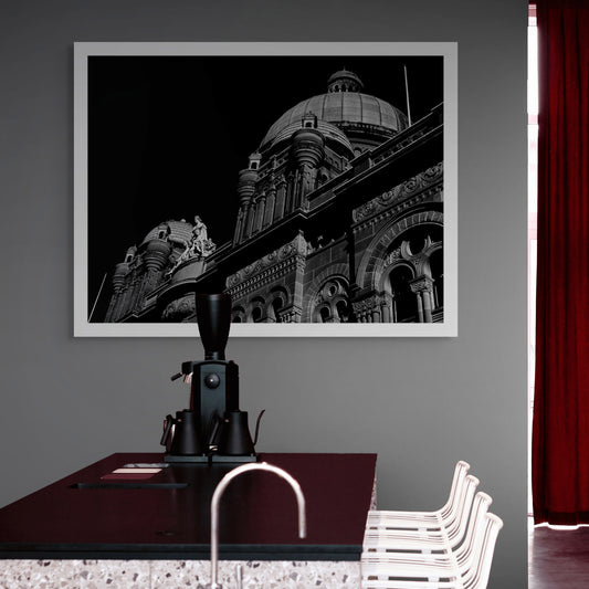 Monochrome Mix - Sydney - QVB - 231101v3 - Room View, Black and white photograph of the Queen Victoria Building in Sydney, featuring ornate domes, detailed façade architecture, and classical sculpture against a dark sky.