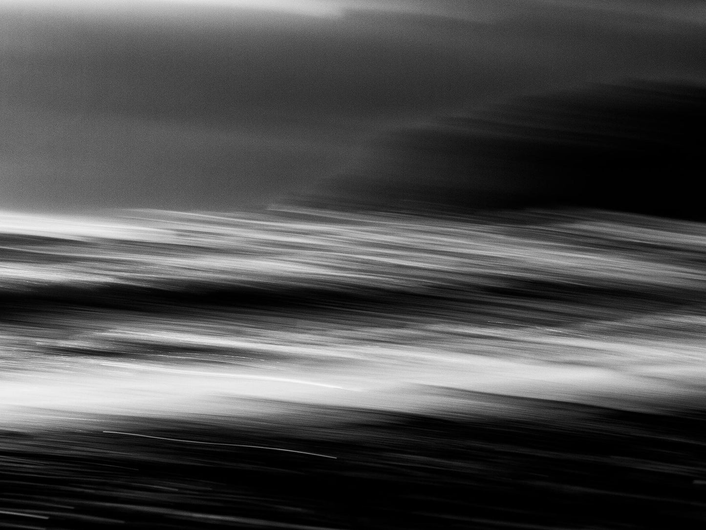 Monochrome Mix - Wave Motion - 80084 - 90x60cm, A black and white abstract seascape with motion blur capturing the energy and flow of ocean waves in horizontal streaks. Dynamic and expressive. Limited edition fine art print.