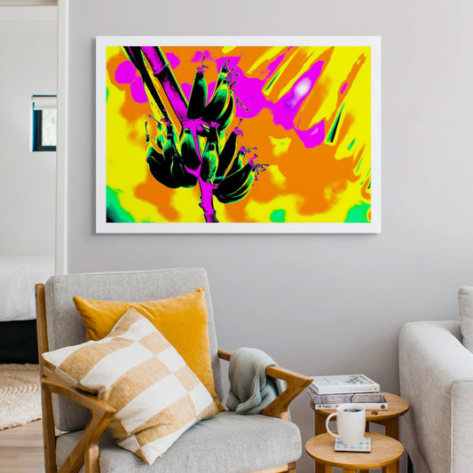 Pop Art Flowers - Bananas 3464v6 - Room View, a surreal pop art style image of green, black bananas on a vibrant pink stalk, set against a fiery backdrop of orange, yellow, and magenta. The colours are hyper saturated, creating a playful and psychedelic tropical scene.