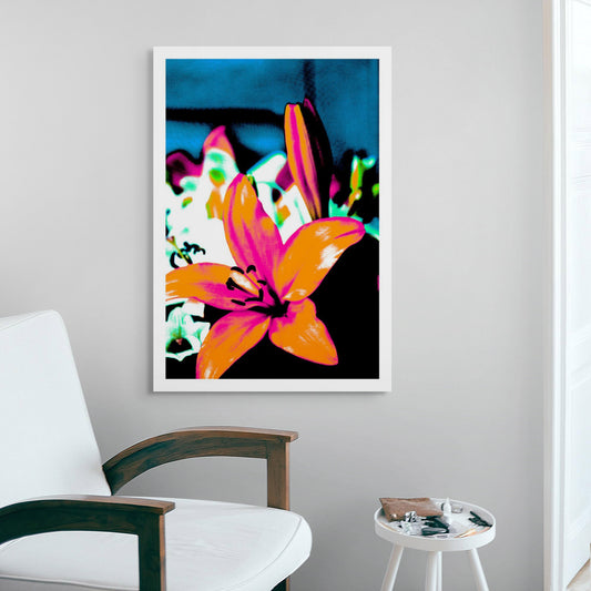 Pop Art Flowers - Lilies 4767v24a - Room View, a pop art style image of a lily in vivid orange and pink tones, with white lilies blurred in the background against a dark blue and black field. The saturated colours and bold composition evoke a modern, graphic elegance.