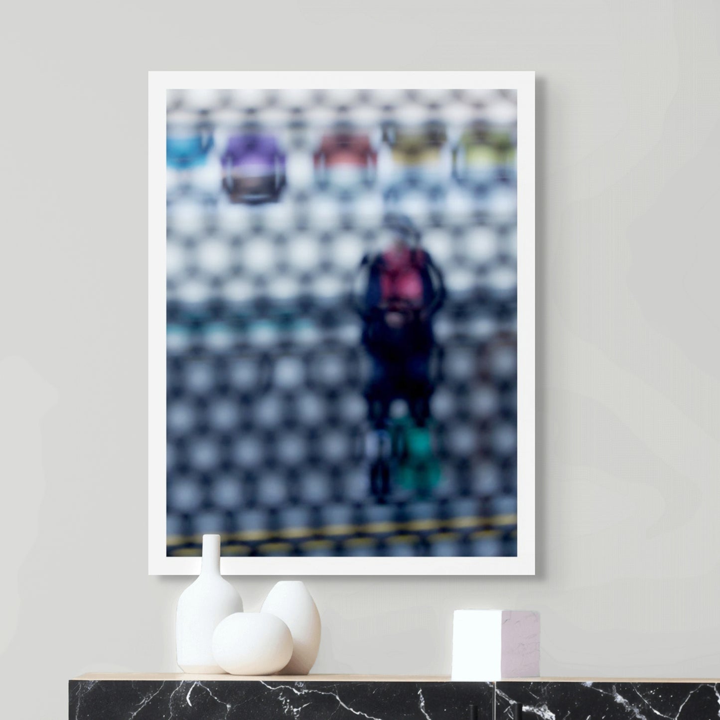 Urban Commute - Series No.2: 9153 - Room View, fine art photograph by Raymond Mather showing a blurred figure in red and navy with a backpack and helmet, standing before a row of colourful train seats. Seen through a circular grid, the image evokes themes of pause, movement, and visual abstraction.