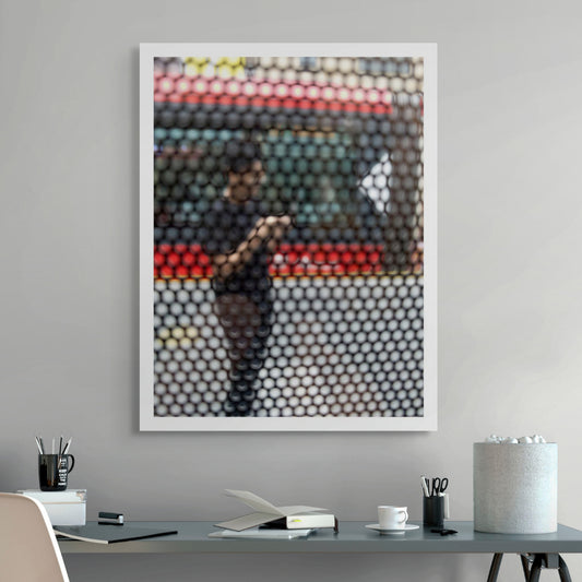 Urban Commute - Series No.2: 9574(1)v1 - Room View, fine art photograph by Raymond Mather featuring a blurred figure using a phone, seen through a patterned screen with a red and green bus in the background. A richly layered urban image exploring distraction, movement, and modern life.