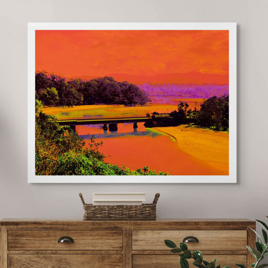 Vivid Country - Sawtell Boambee Creek Railway Bridge - 5223v14 - Room View, a bold panoramic coastal landscape in vivid orange, green, and purple hues, featuring the Boambee railway bridge over reflective creek waters with bushland and mountain silhouettes in the distance.