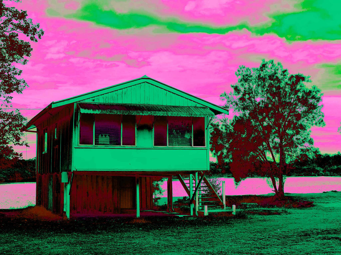 Vivid Country - Urunga River House - 6394v24a - 90x67.5cm, a Pop Art style fine art print depicting a raised weatherboard house beside the river in Urunga, NSW. Rendered in vibrant green and pink tones with rich shadowing, the image celebrates everyday architecture and riverside stillness.