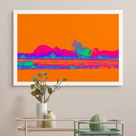 Vivid Country - Warrumbungle - 4715v14a - Room View, a striking Pop Art-style fine art print of the Warrumbungle Ranges in Central NSW, featuring vivid pink and violet landforms beneath an intense orange sky, with neon green trees and fiery red plains in the foreground.