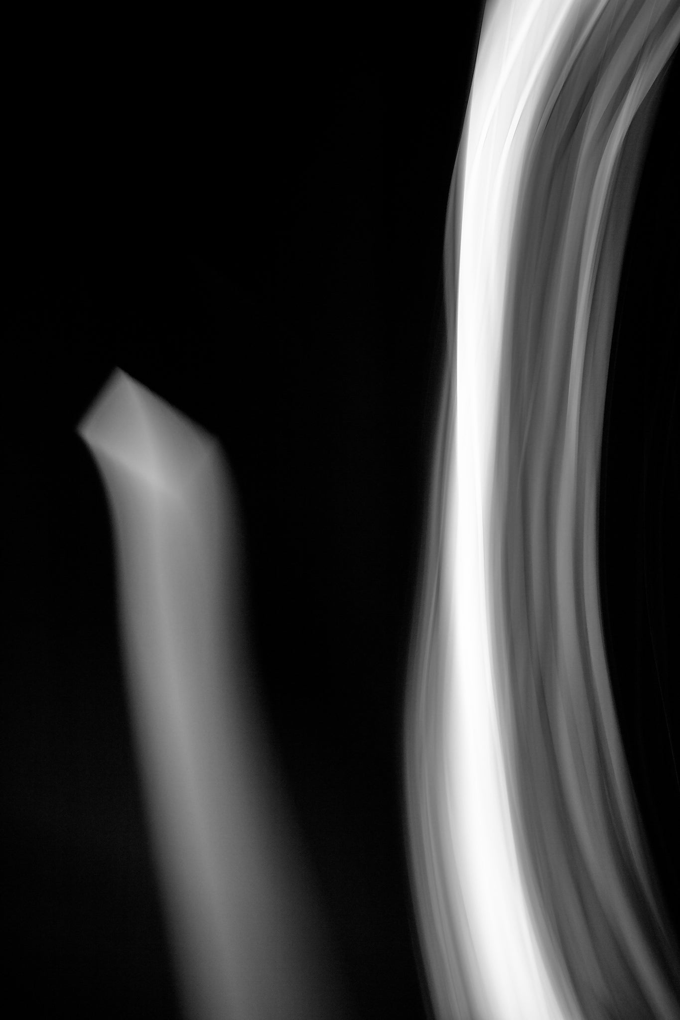 Dancing into the Light 7884v3 - 60x90cm, black and white minimalist light drawing expressing movement, limited edition fine art print by Raymond Mather, ART1 collection.