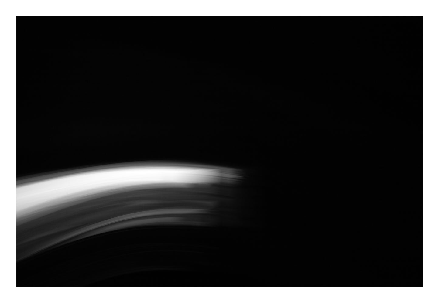 Dancing into the Light 7885v4 - 104x74cm, black and white minimalist coastal photograph with bold wave line, limited edition fine art print by Raymond Mather, ART1 collection.