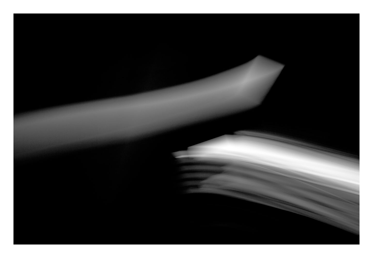 Dancing into the Light 7886v3 - 104x74cm, black and white minimalist coastal photograph with soft horizon glow, limited edition fine art print by Raymond Mather, ART1 collection.