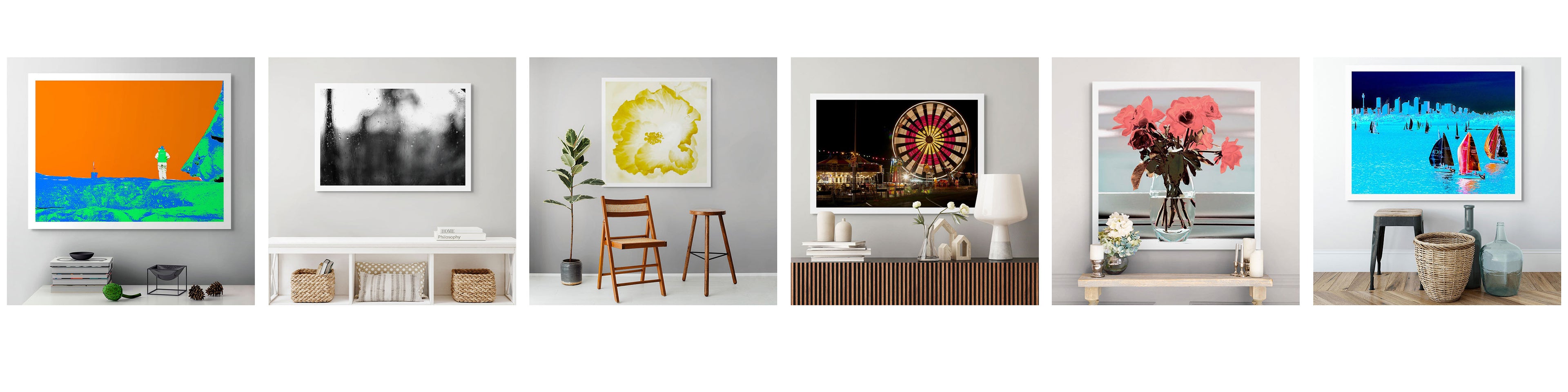 Row of framed artworks from ART1 displayed on a white background, featuring multiple series including Xtra POP, Narrative Works, Coastal Noir, and Pop Art Flowers, photographed by Australian photographer Raymond Mather.