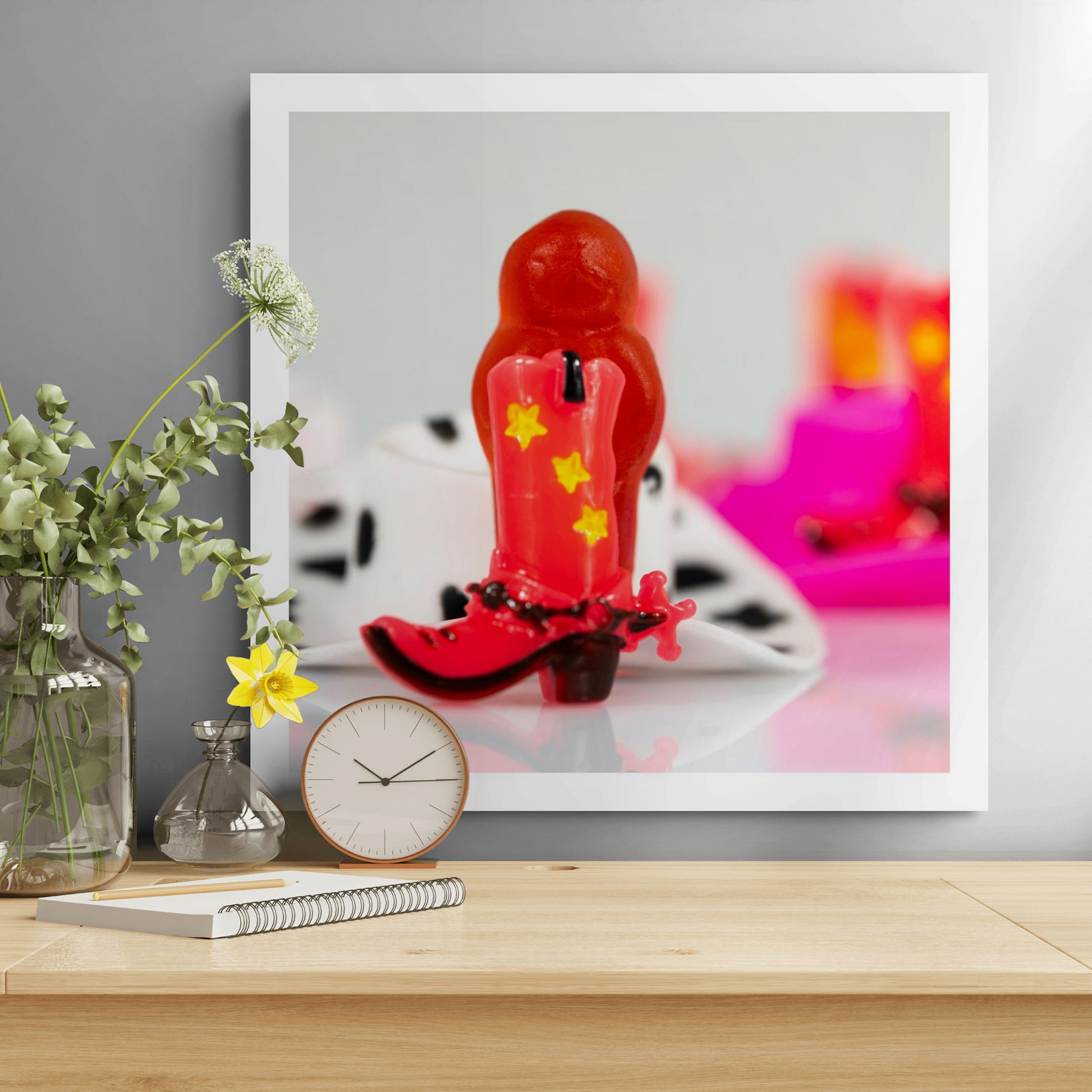 Boot Scootin’ Baby 266831v1 by Raymond Mather displayed as a large contemporary photographic artwork above a timber desk in a modern interior.