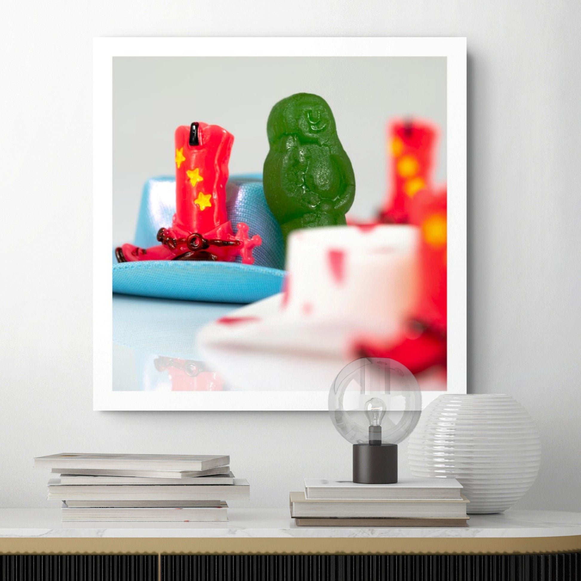 Boot Scootin’ Baby 266845v1 by Raymond Mather displayed as a square photographic artwork above a contemporary console.