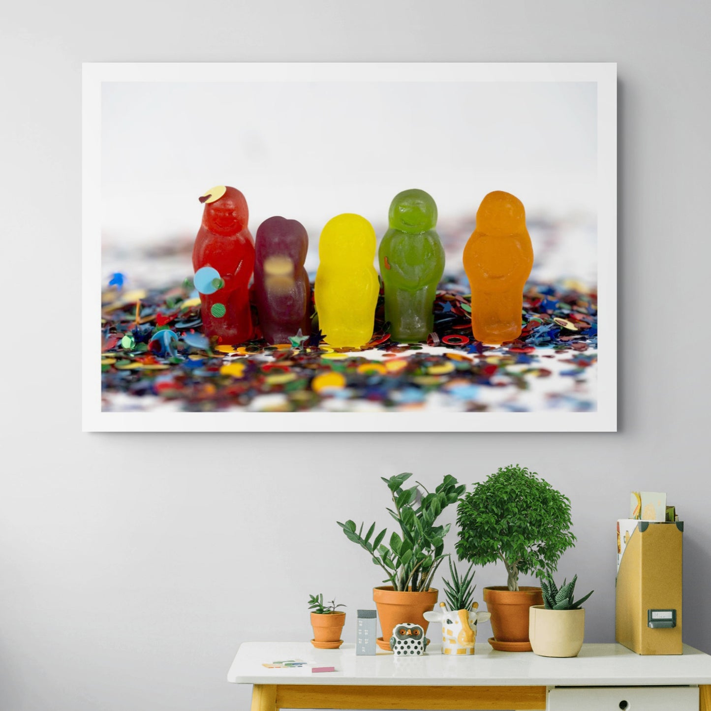 Celebration Time - 267244v1 by Raymond Mather displayed as a large landscape photographic artwork above a contemporary console with indoor plants.