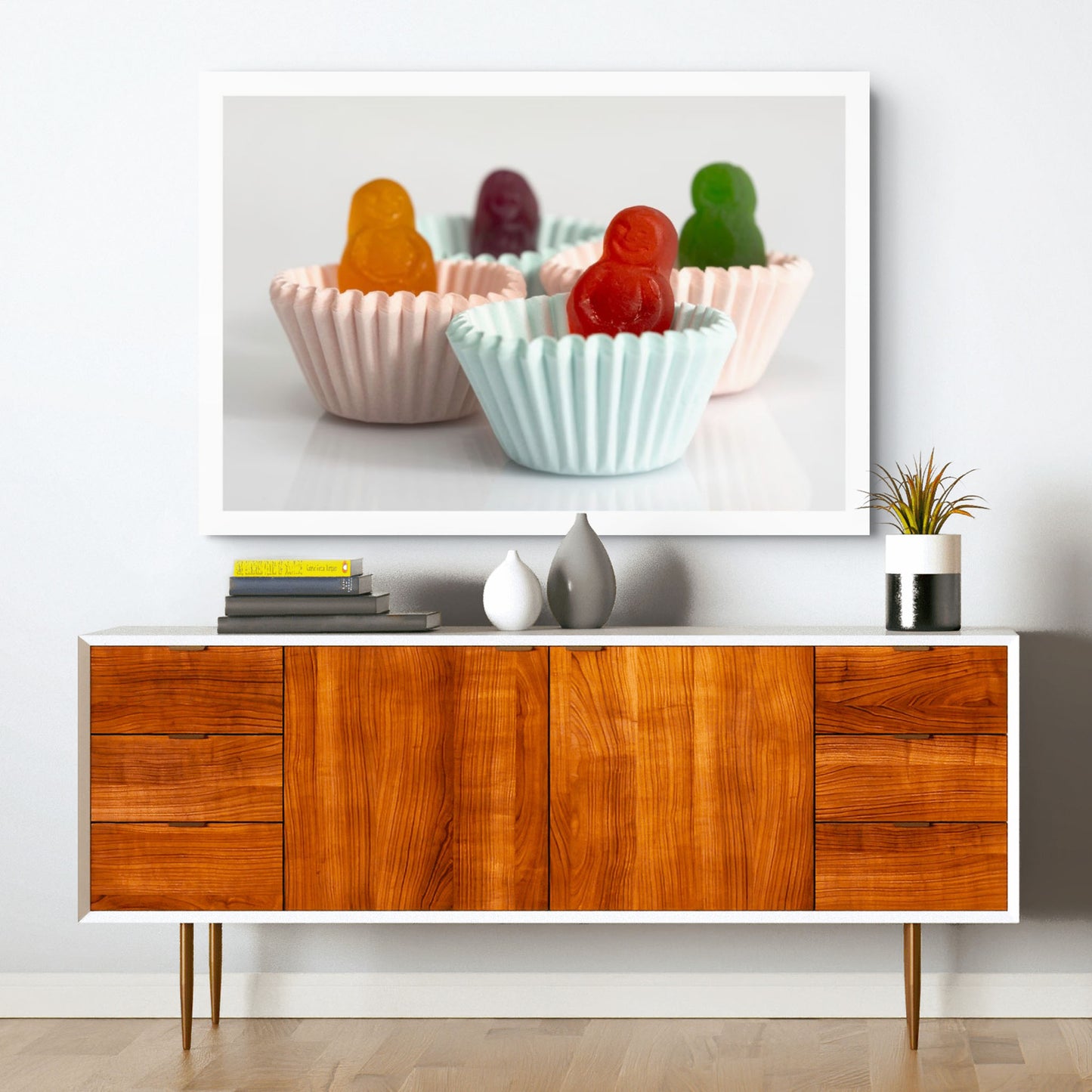 Cupcakes - 266655v1 displayed as a large landscape photographic artwork above a timber sideboard in a contemporary interior.
