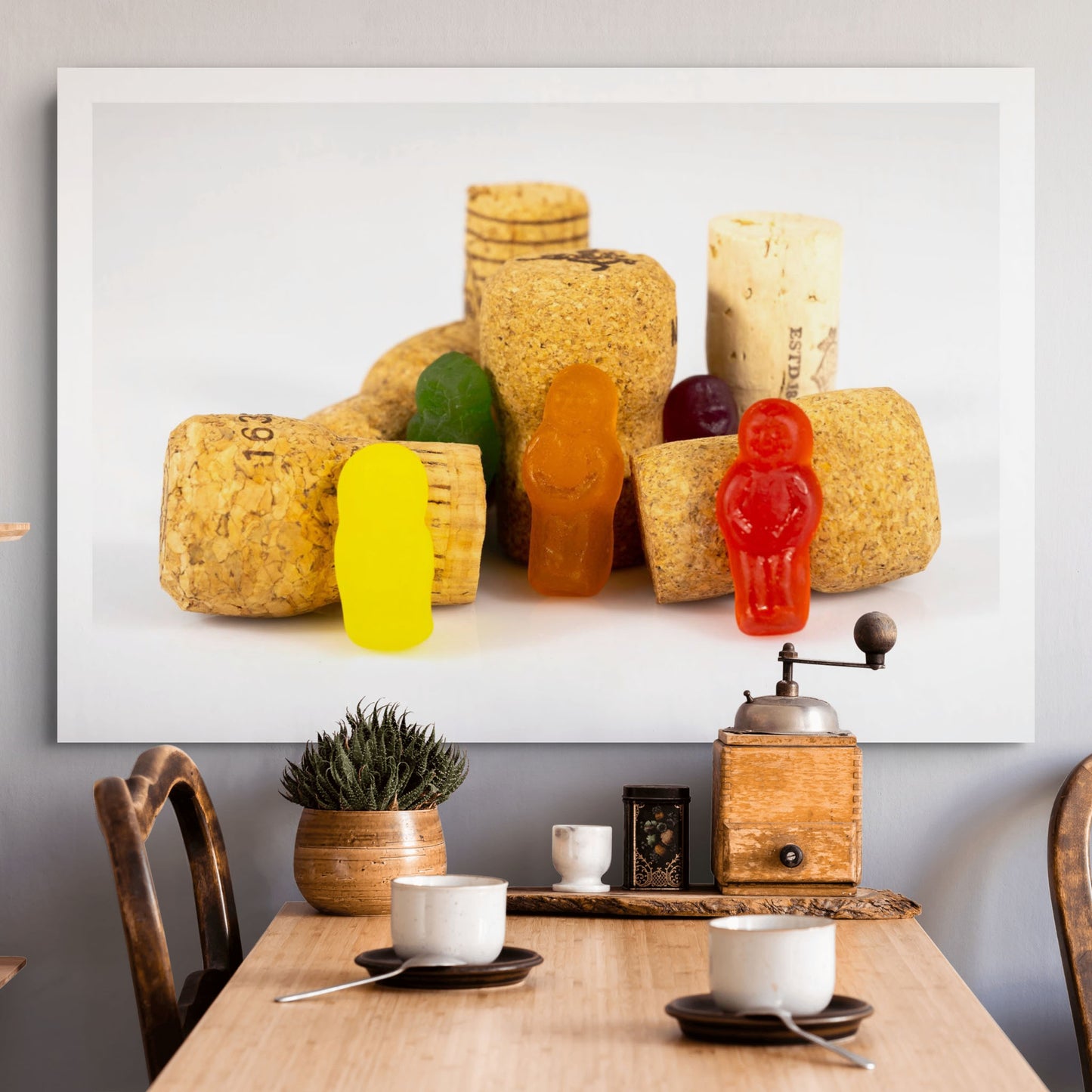 What A Corker - 266641v1 photographic artwork featuring colourful confectionery figures among wine corks, displayed in a contemporary dining interior.