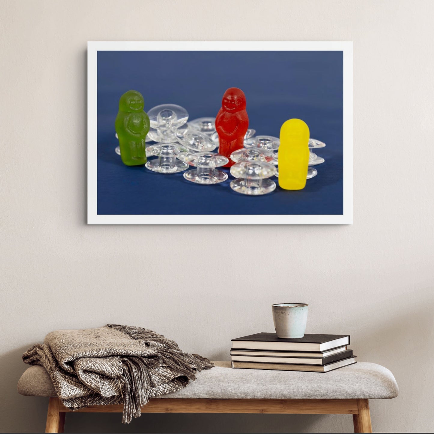 Bobbin Around photographic artwork displayed as a large white-framed print above a timber bench in a contemporary interior.