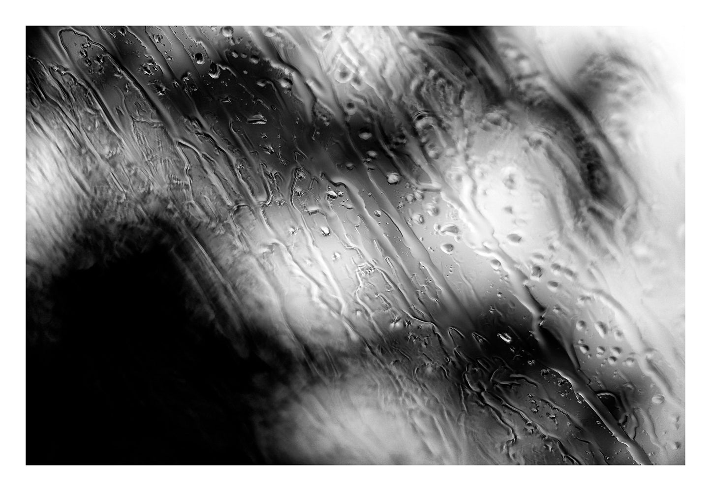 Coastal Noir 7964 - 104x74cm, black and white coastal scene of trees and shoreline blurred behind rain-speckled glass, minimalist fine art print.