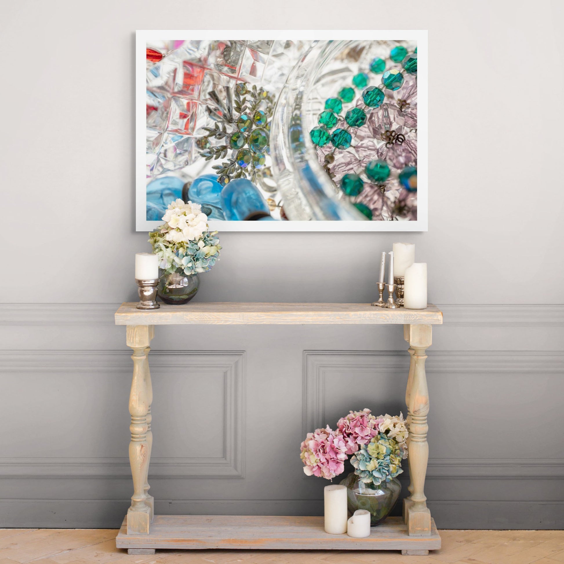 Still Life artwork of blue, green, red, gems and jewels in crystal by Australian photographer Raymond Mather at ART1 Fine Art Photography, situated in Art Placer room view.