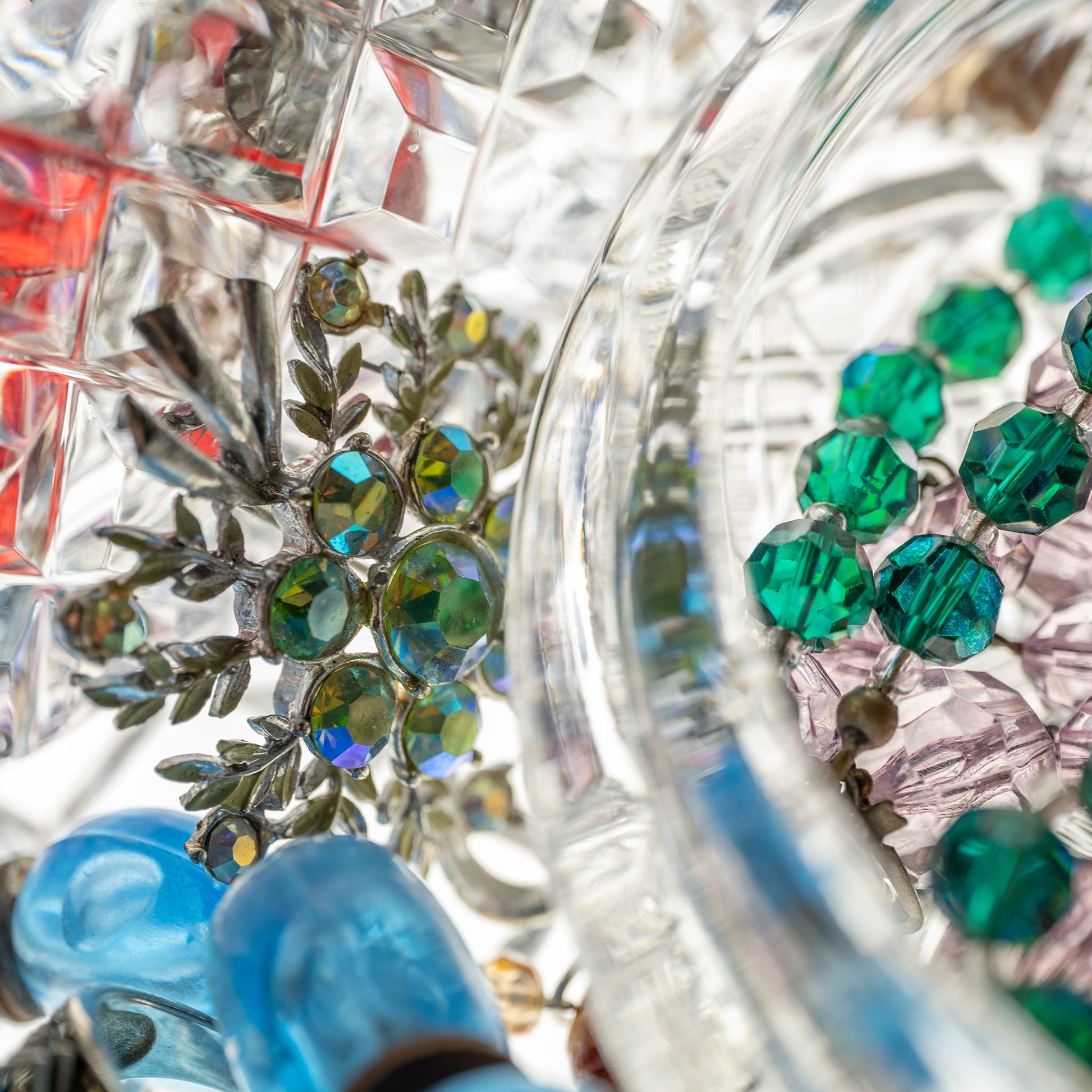 Still Life artwork of blue, green, red, gems and jewels in crystal by Australian photographer Raymond Mather at ART1 Fine Art Photography, detail crop view.