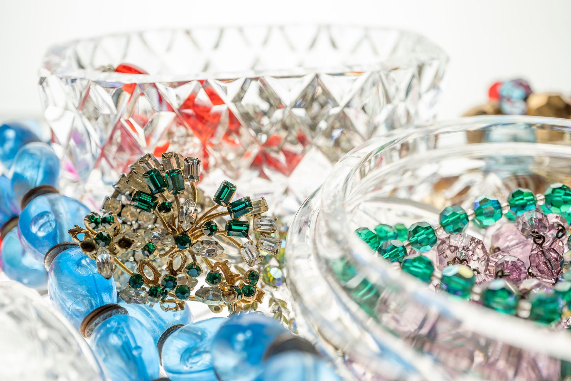 Still Life artwork of blue, green, red, gems and jewels in crystal boxes by Australian photographer Raymond Mather at ART1 Fine Art Photography, full view.