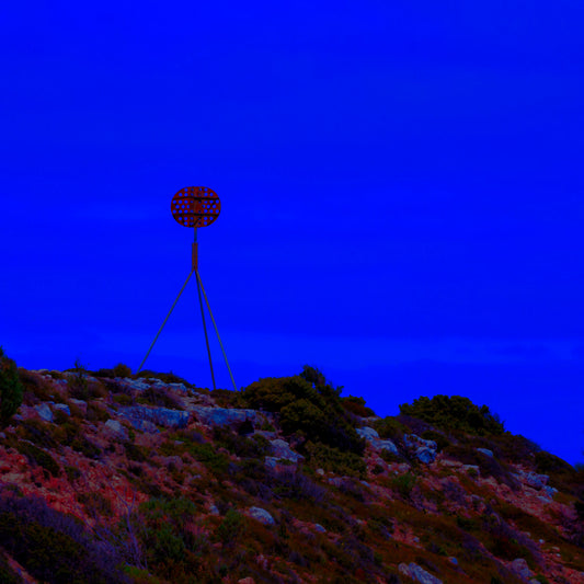 Vivid Country - Cape Jervis Heysen Trail - 7290v2 - Close Detail View, a lone marker on the Heysen Trail stands atop a rocky hill under a vivid cobalt blue sky, evoking solitude and direction on South Australia’s coast.