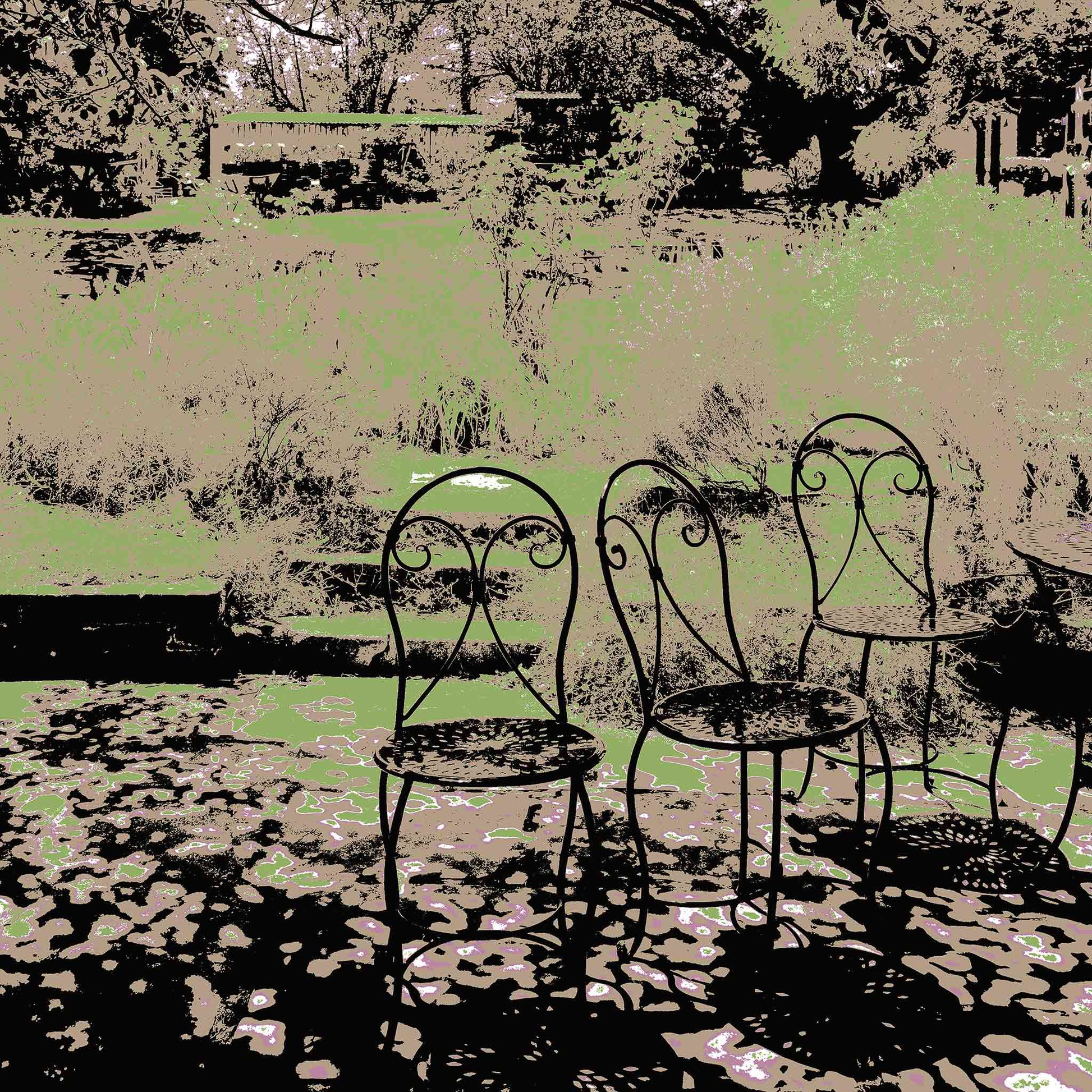 Vivid Country - Castlemaine Buda Garden Seats - 4313v25a - Close Detail View, a trio of vintage wrought iron chairs in dappled shade beneath leafy trees, set against a muted garden backdrop in soft greens and earth tones.