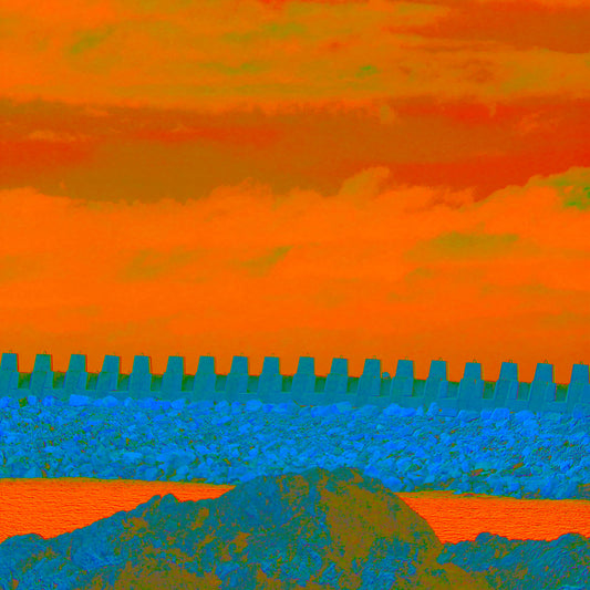 Vivid Country - Coffs Harbour South Breakwall - 6111v7 - Close Detail View, a vividly stylised photograph of a concrete breakwall beneath a blazing orange and green sky, with layers of rocky land and glowing water in the foreground.