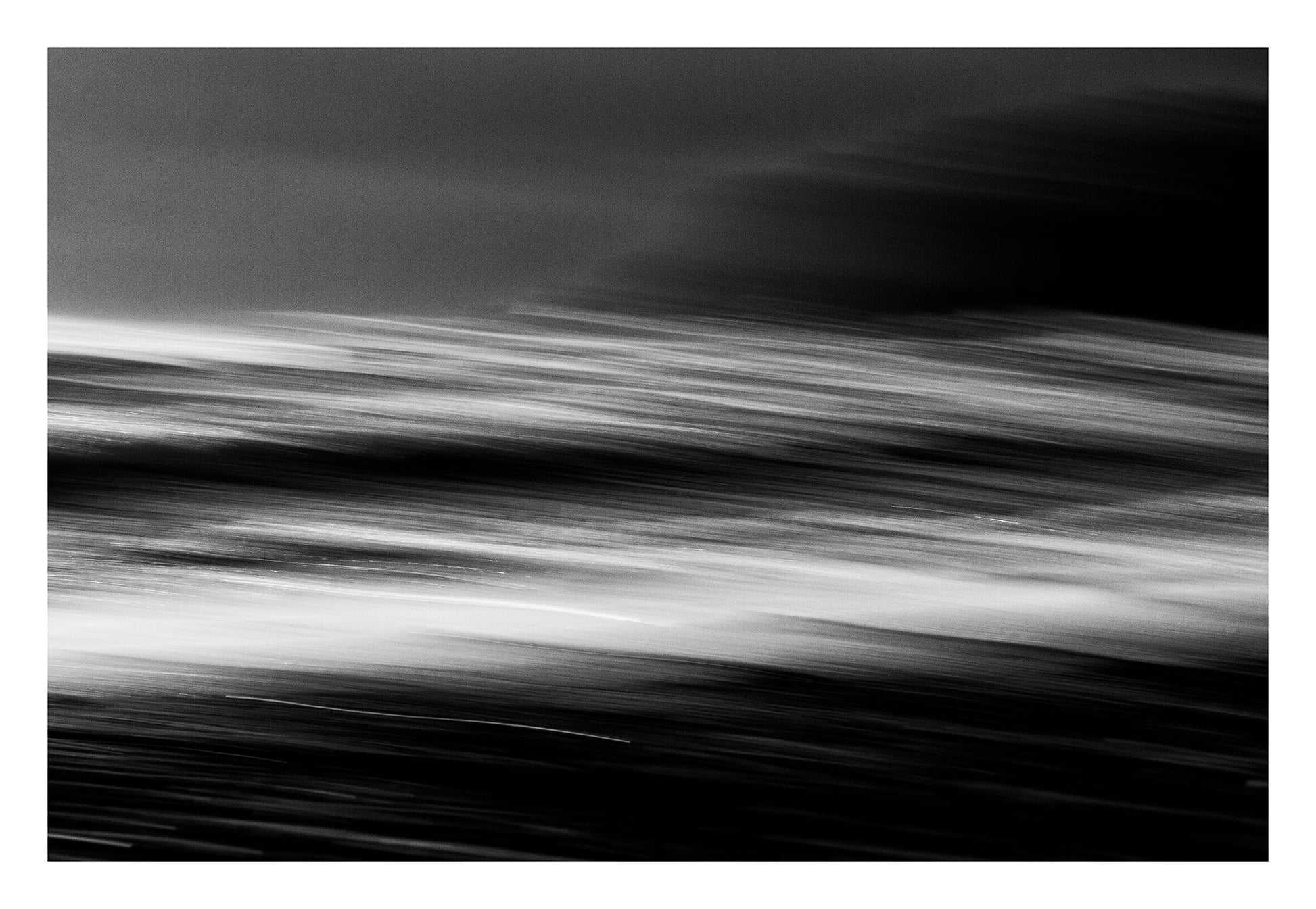 Monochrome Mix - Wave Motion - 80084 - 104x74cm, A black and white abstract seascape with motion blur capturing the energy and flow of ocean waves in horizontal streaks. Dynamic and expressive. Limited edition fine art print.