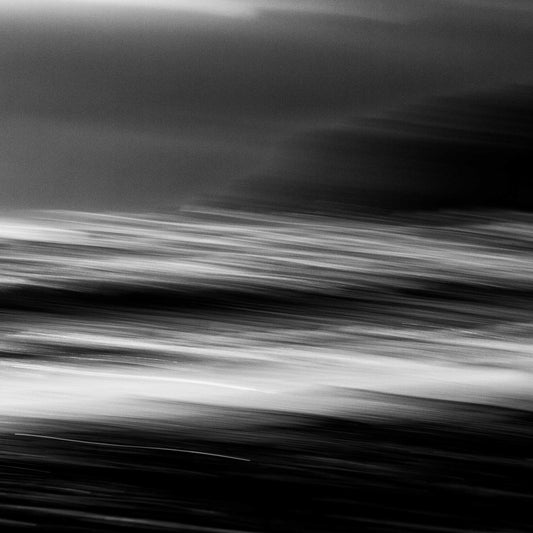 Monochrome Mix - Wave Motion - 80084 - Close Detail View, A black and white abstract seascape with motion blur capturing the energy and flow of ocean waves in horizontal streaks. Dynamic and expressive. Limited edition fine art print.