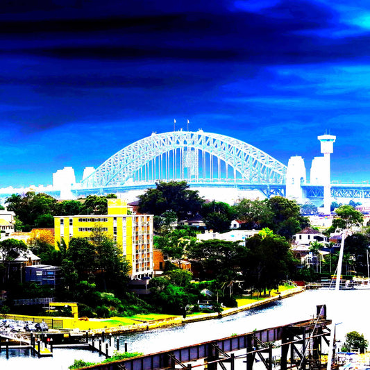 POPscape Sydney - Harbour Bridge View - 190022v89 - Close Detail View, Vibrant stylised view of Sydney Harbour Bridge with saturated blue sky, suburban rooftops, and a bold yellow building in the foreground overlooking the water.